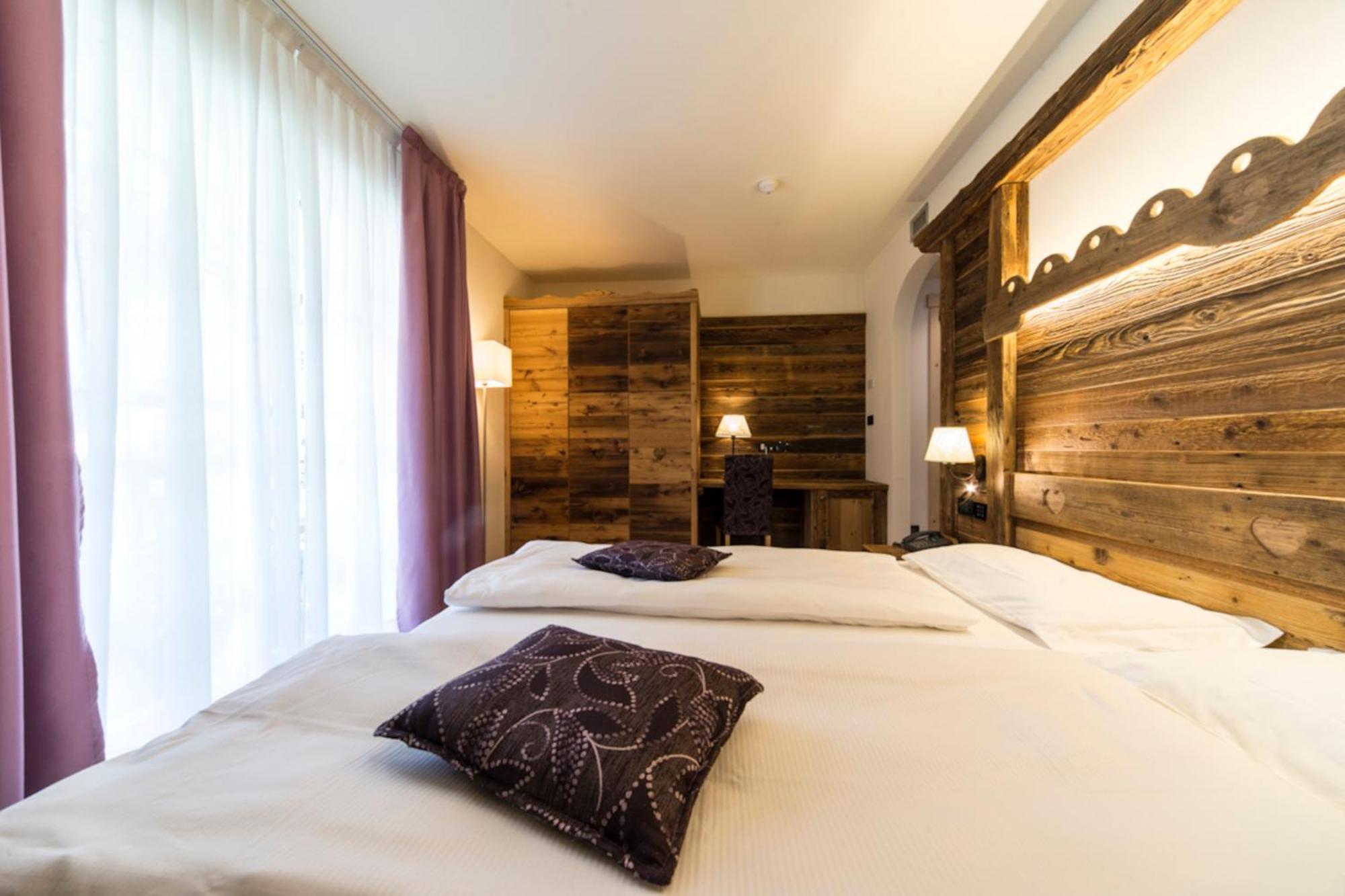 Alpholiday Dolomiti Wellness & Family Hotel Dimaro Pokoj fotografie
